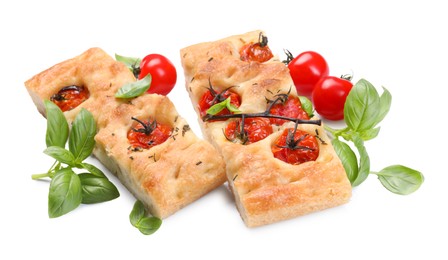 Photo of Pieces of delicious focaccia with tomatoes and spices isolated on white