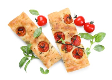 Photo of Pieces of delicious focaccia with tomatoes and spices isolated on white, top view