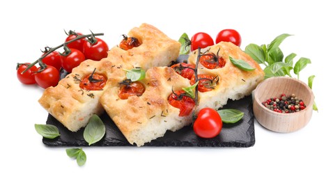 Photo of Pieces of delicious focaccia with tomatoes and spices isolated on white