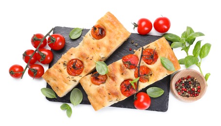 Photo of Pieces of delicious focaccia with tomatoes and spices isolated on white, top view