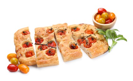 Photo of Cut delicious focaccia with tomatoes and spices isolated on white
