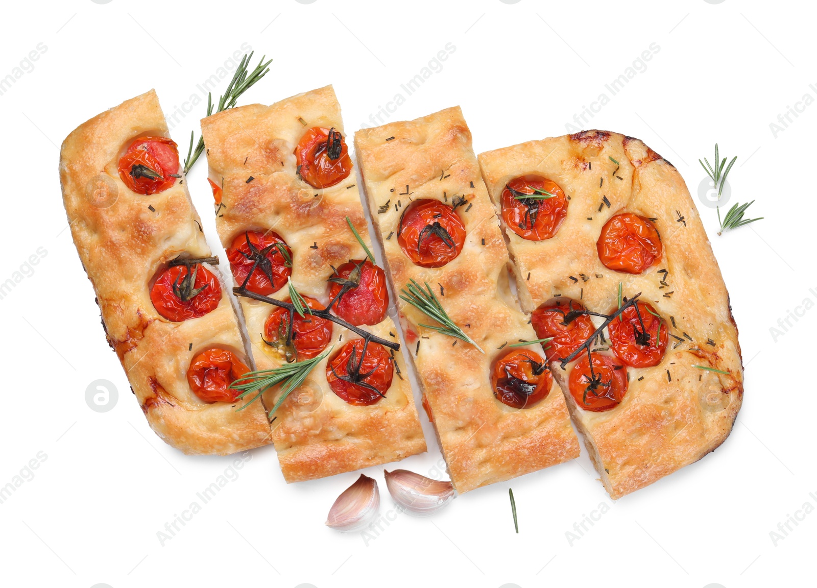Cut delicious focaccia with tomatoes and spices isolated on white, top view Photo of Cut delicious focaccia with tomatoes and spices isolated on white, top view
