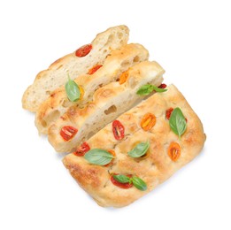 Photo of Cut delicious focaccia with tomatoes and basil isolated on white, top view