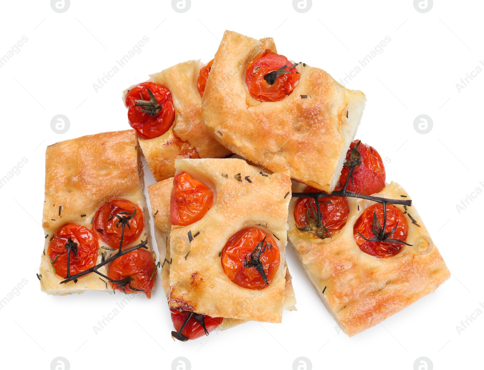 Pieces of delicious focaccia with tomatoes and spices isolated on white, top view Photo of Pieces of delicious focaccia with tomatoes and spices isolated on white, top view