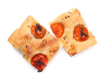 Photo of Pieces of delicious focaccia with tomatoes and spices isolated on white, top view