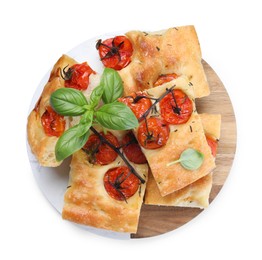 Photo of Pieces of delicious focaccia with tomatoes and spices isolated on white, top view