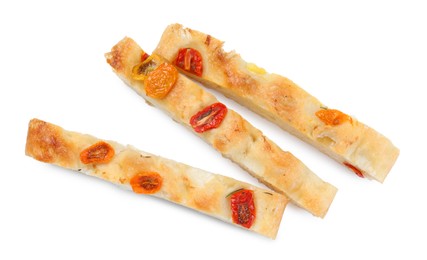 Photo of Pieces of delicious focaccia with tomatoes isolated on white, top view