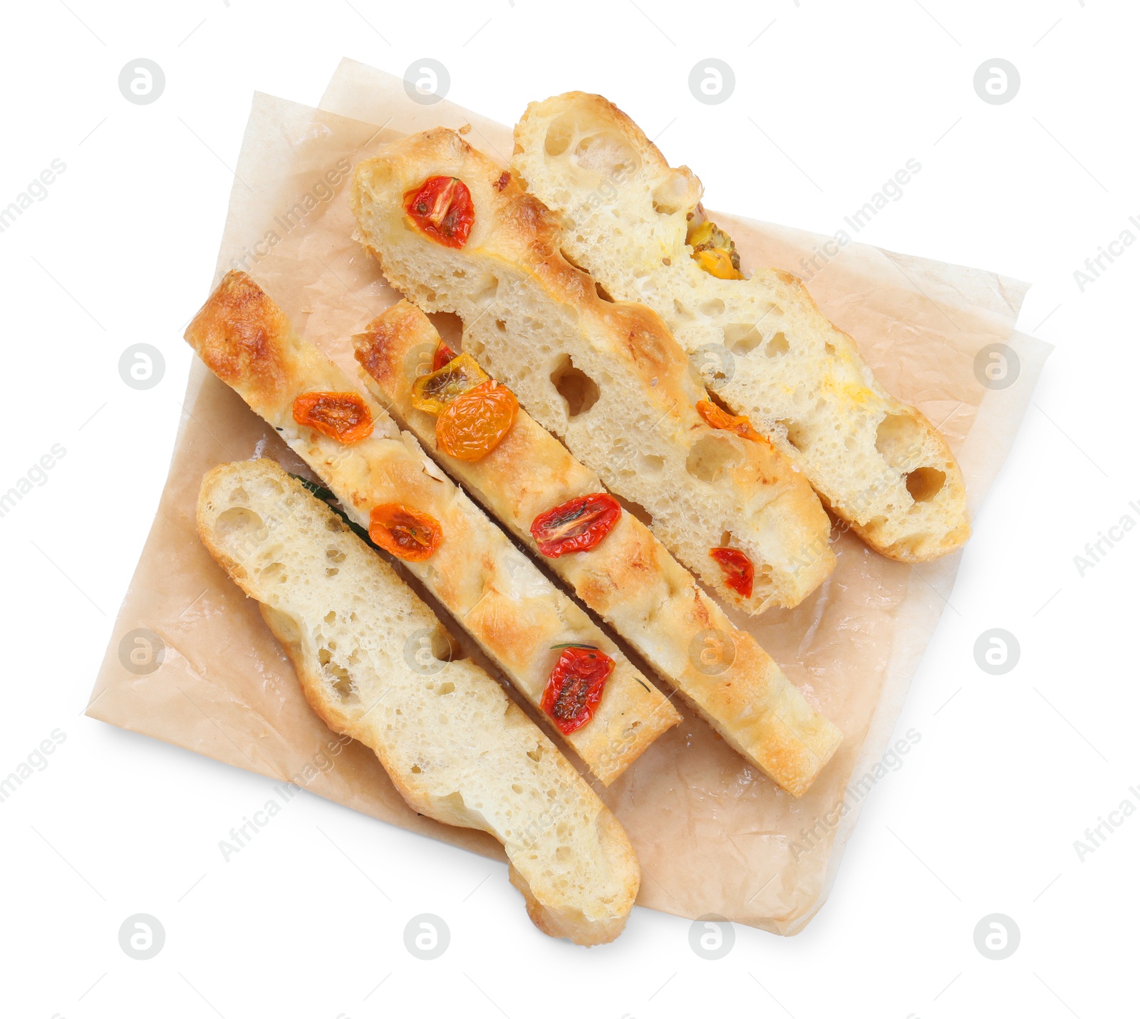 Pieces of delicious focaccia with tomatoes isolated on white, top view Photo of Pieces of delicious focaccia with tomatoes isolated on white, top view