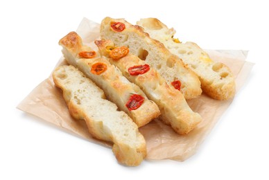 Photo of Pieces of delicious focaccia with tomatoes isolated on white