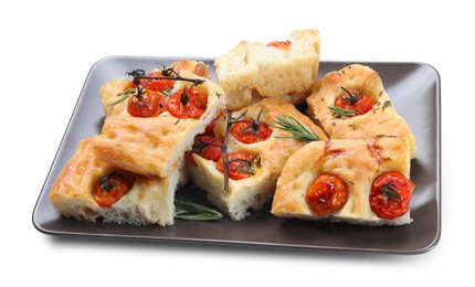 Photo of Pieces of delicious focaccia with tomatoes and spices isolated on white