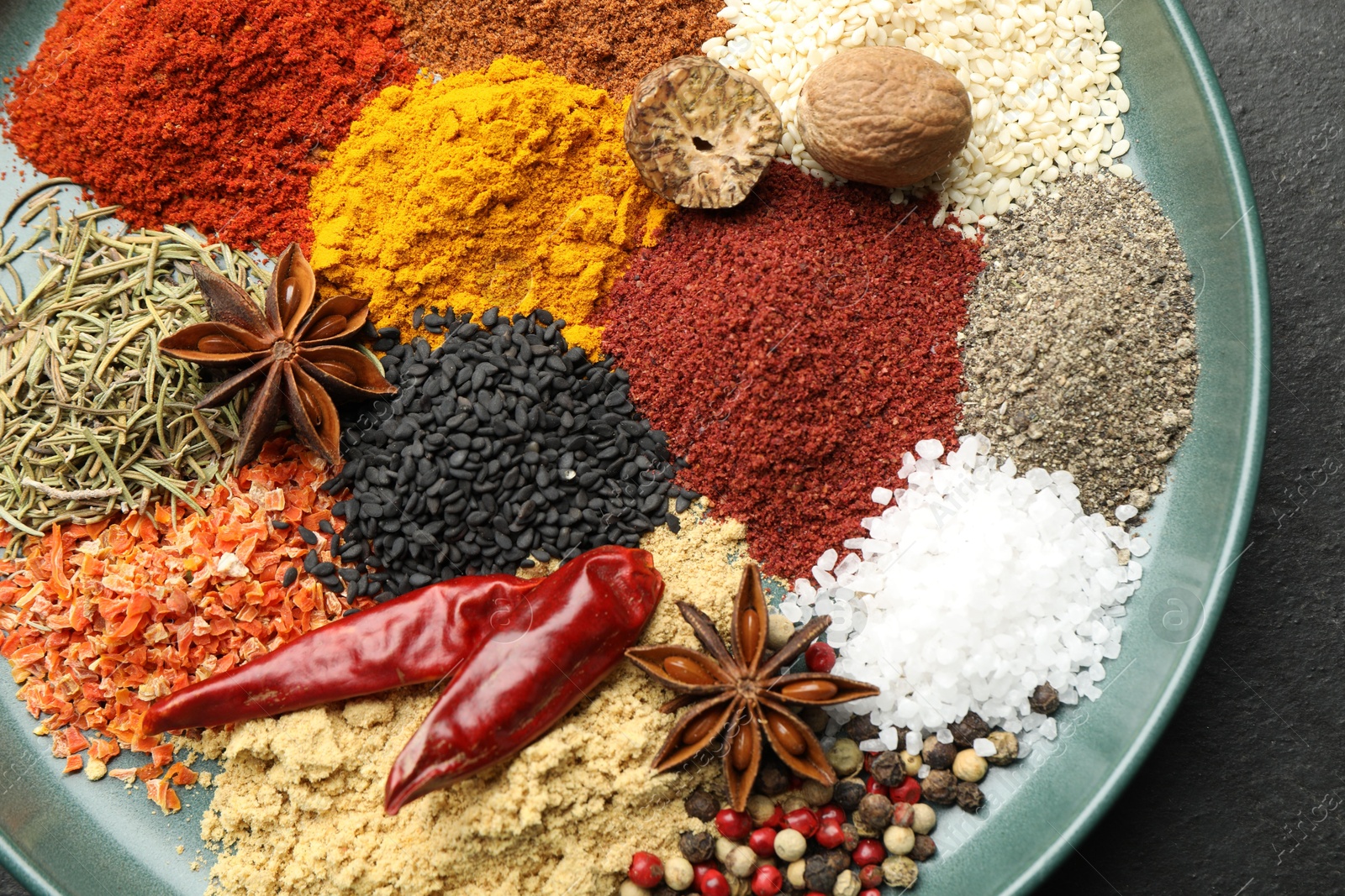 Different aromatic spices on table, top view Photo of Different aromatic spices on table, top view