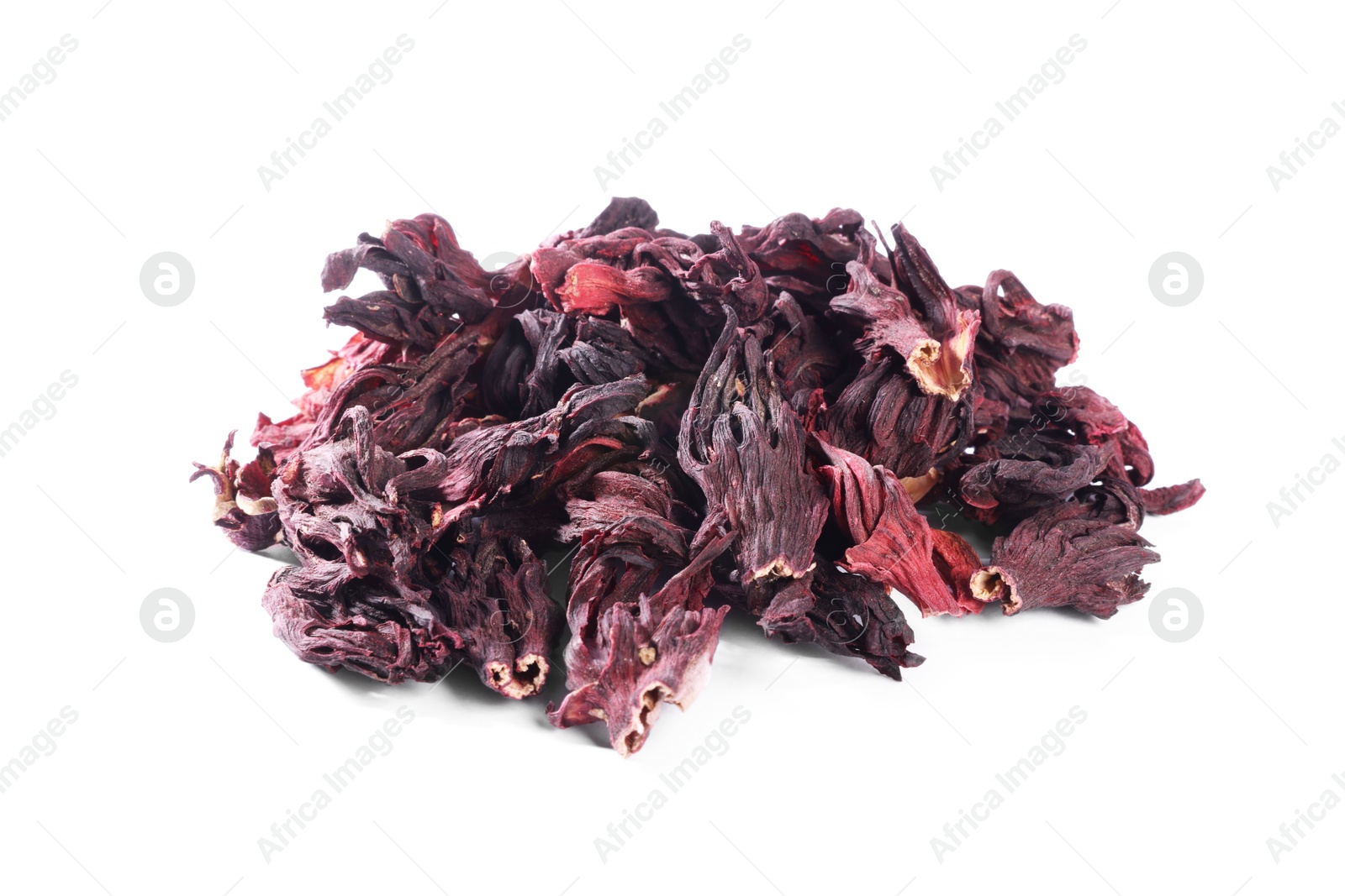 Hibiscus tea. Heap of dried roselle calyces isolated on white Photo of Hibiscus tea. Heap of dried roselle calyces isolated on white