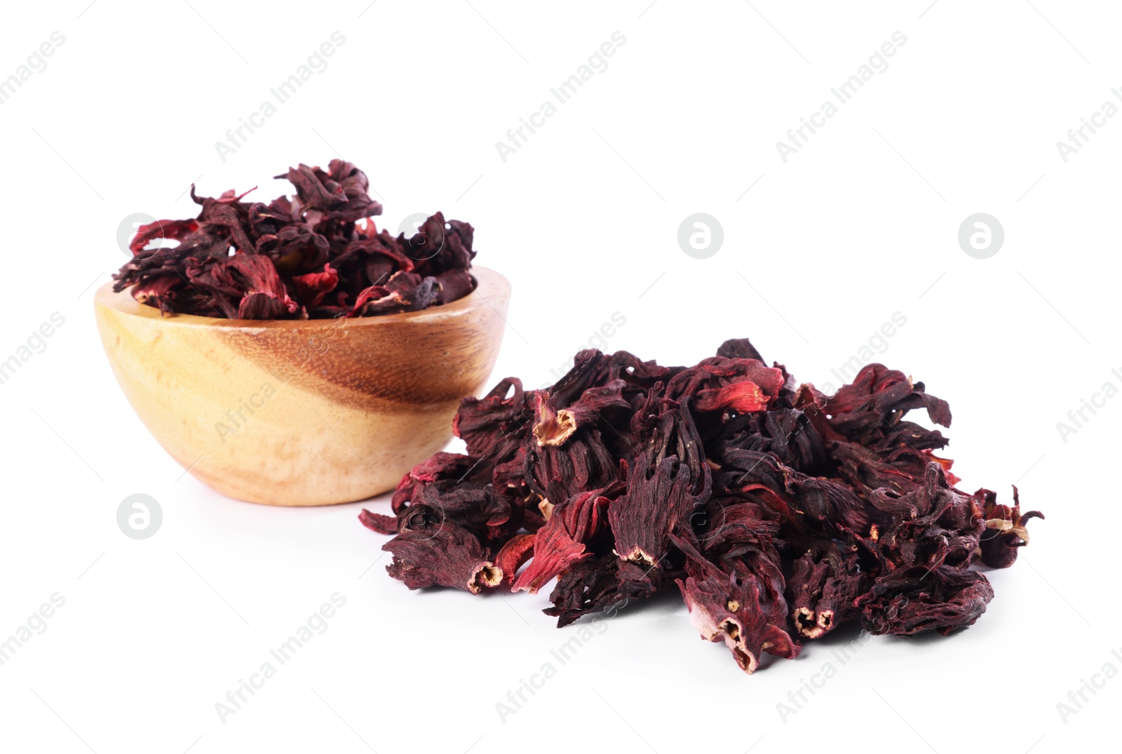 Hibiscus tea. Bowl with dried roselle calyces isolated on white Photo of Hibiscus tea. Bowl with dried roselle calyces isolated on white