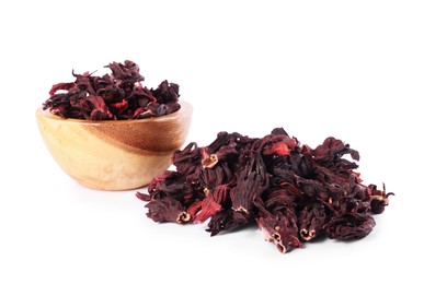 Photo of Hibiscus tea. Bowl with dried roselle calyces isolated on white