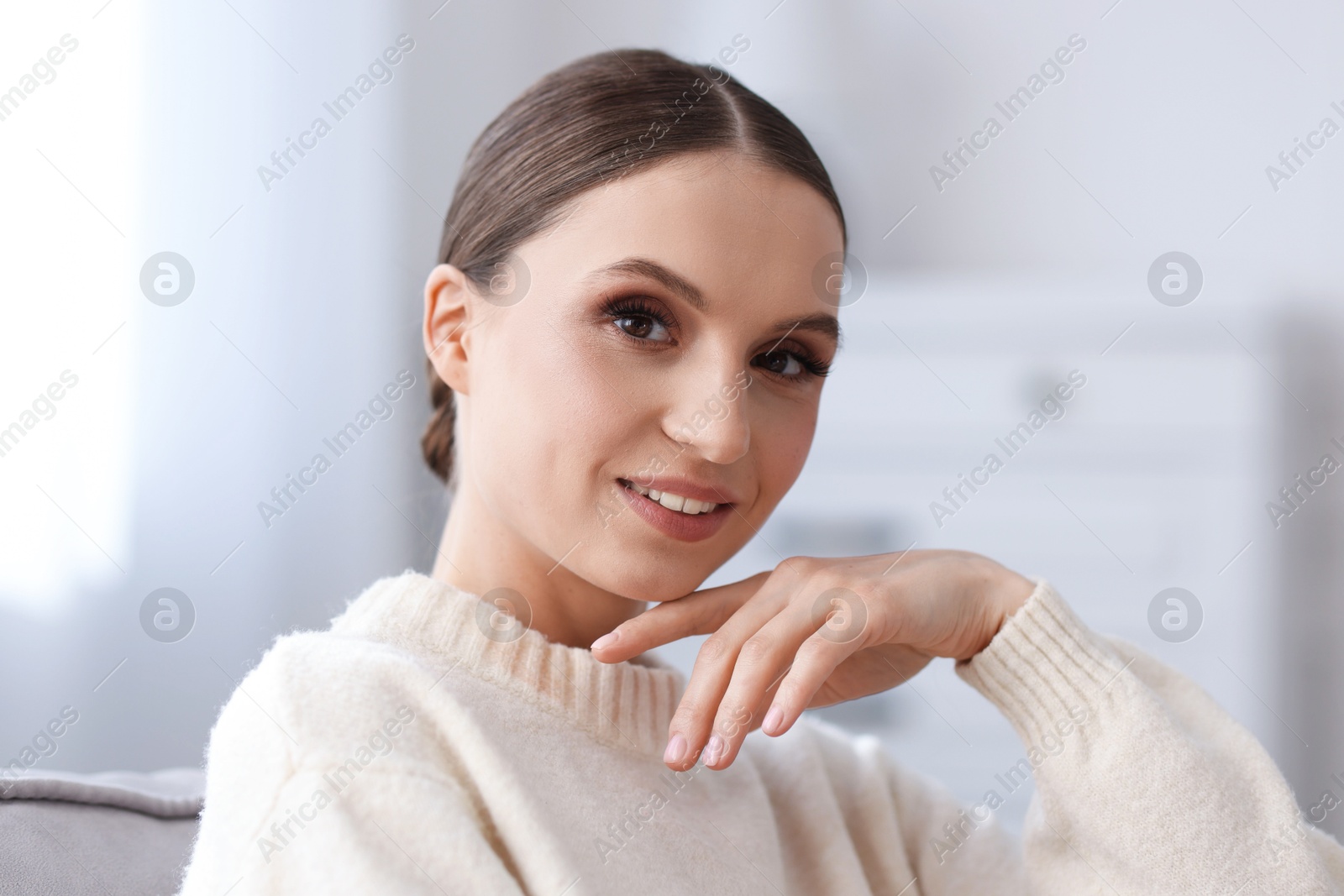 Portrait of beautiful young woman at home Photo of Portrait of beautiful young woman at home