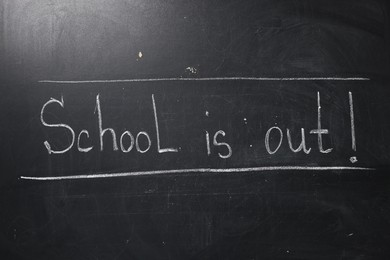 Photo of Phrase School's Out with exclamation mark on blackboard