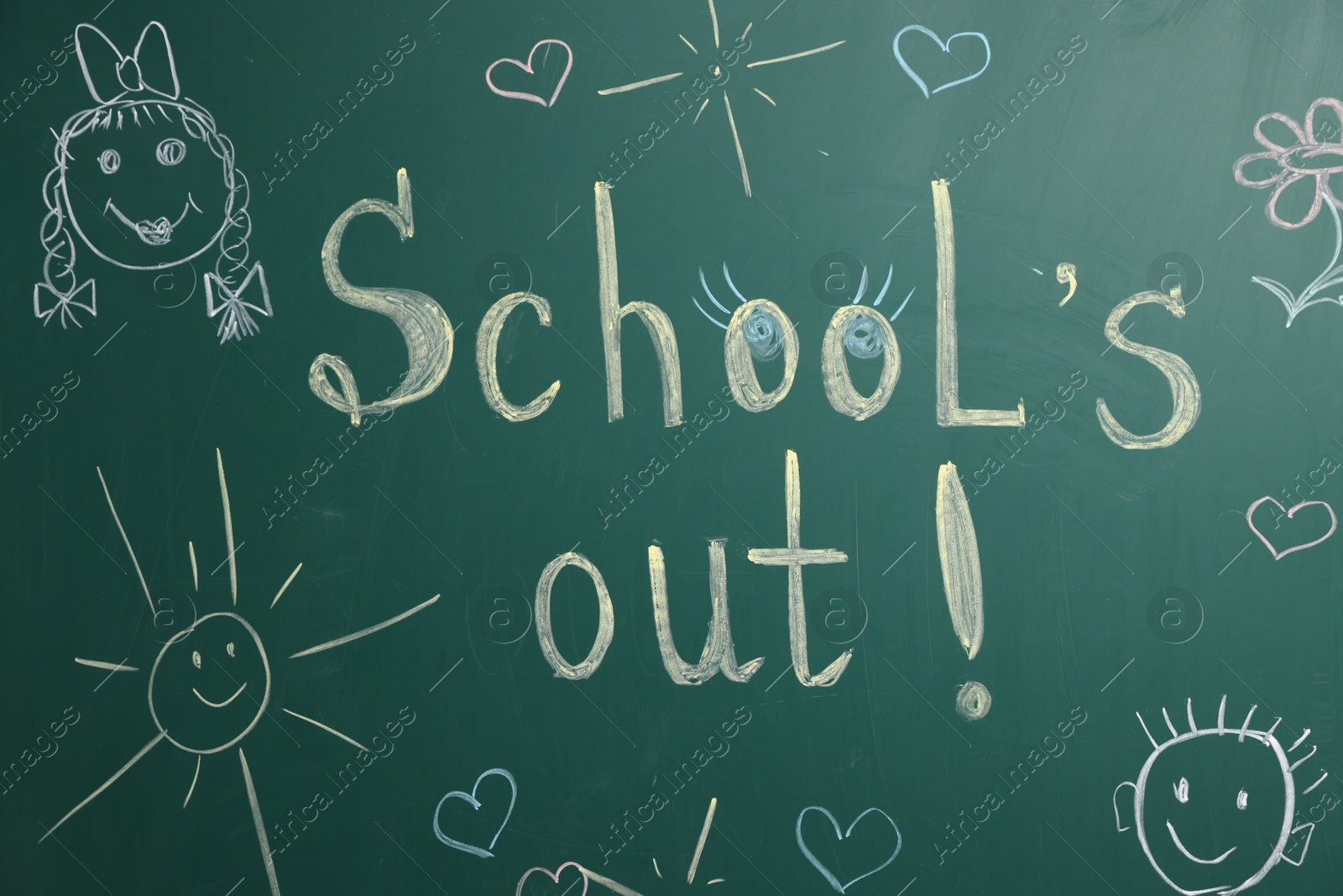 Phrase School's Out with exclamation mark and different drawings on blackboard Photo of Phrase School's Out with exclamation mark and different drawings on blackboard
