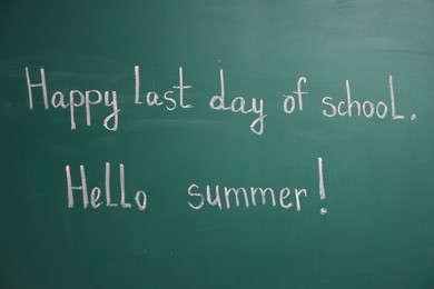 Photo of Phrases Happy Last Day of School and Hello Summer with exclamation mark on blackboard