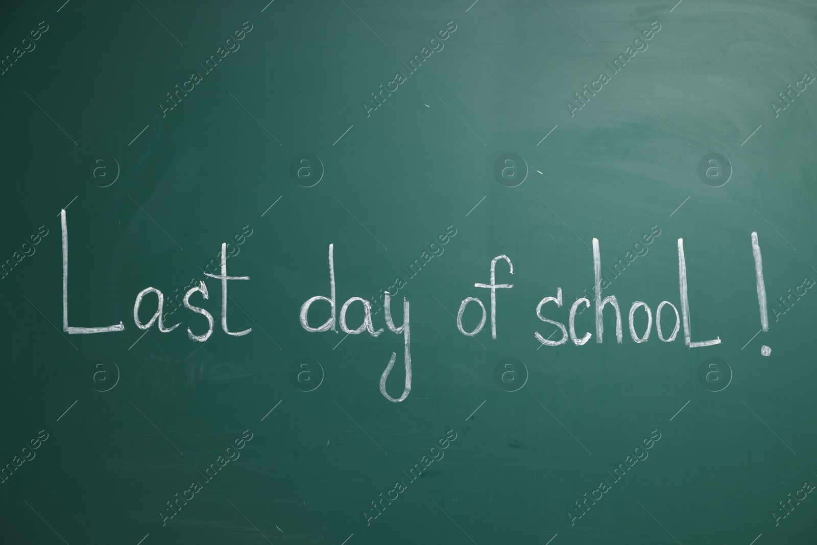 Phrase Last Day of School with exclamation mark on blackboard Photo of Phrase Last Day of School with exclamation mark on blackboard