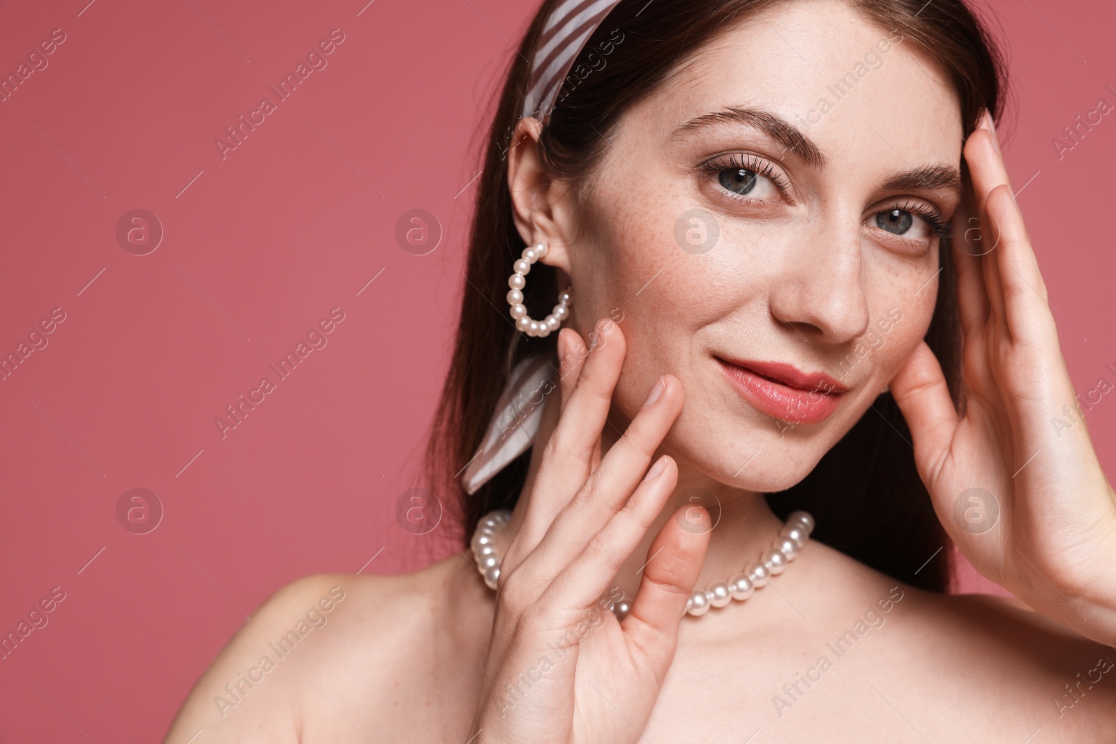 Fashionable portrait of beautiful woman in stylish outfit on pink background. Space for text Photo of Fashionable portrait of beautiful woman in stylish outfit on pink background. Space for text