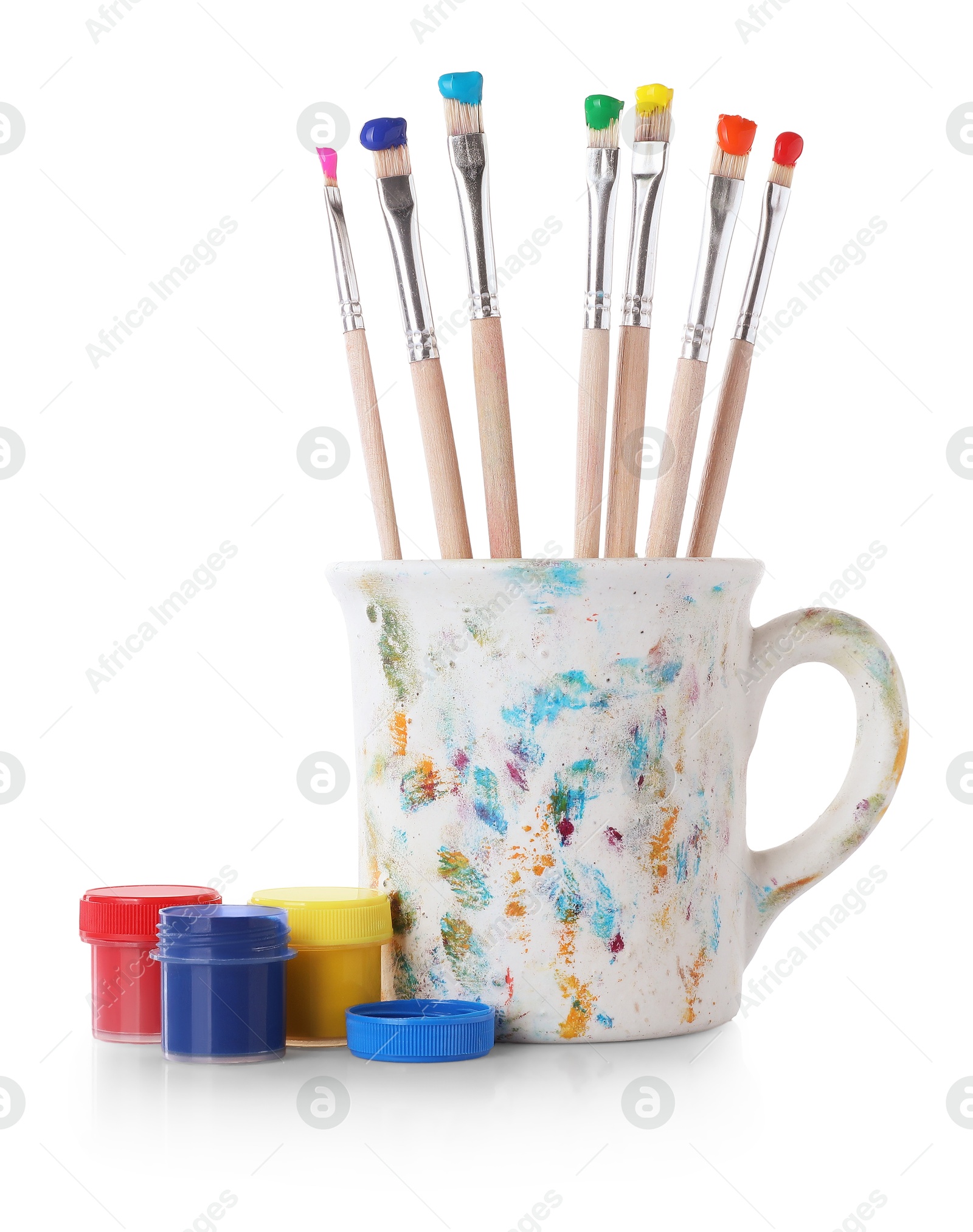 Brushes with color paints isolated on white Photo of Brushes with color paints isolated on white