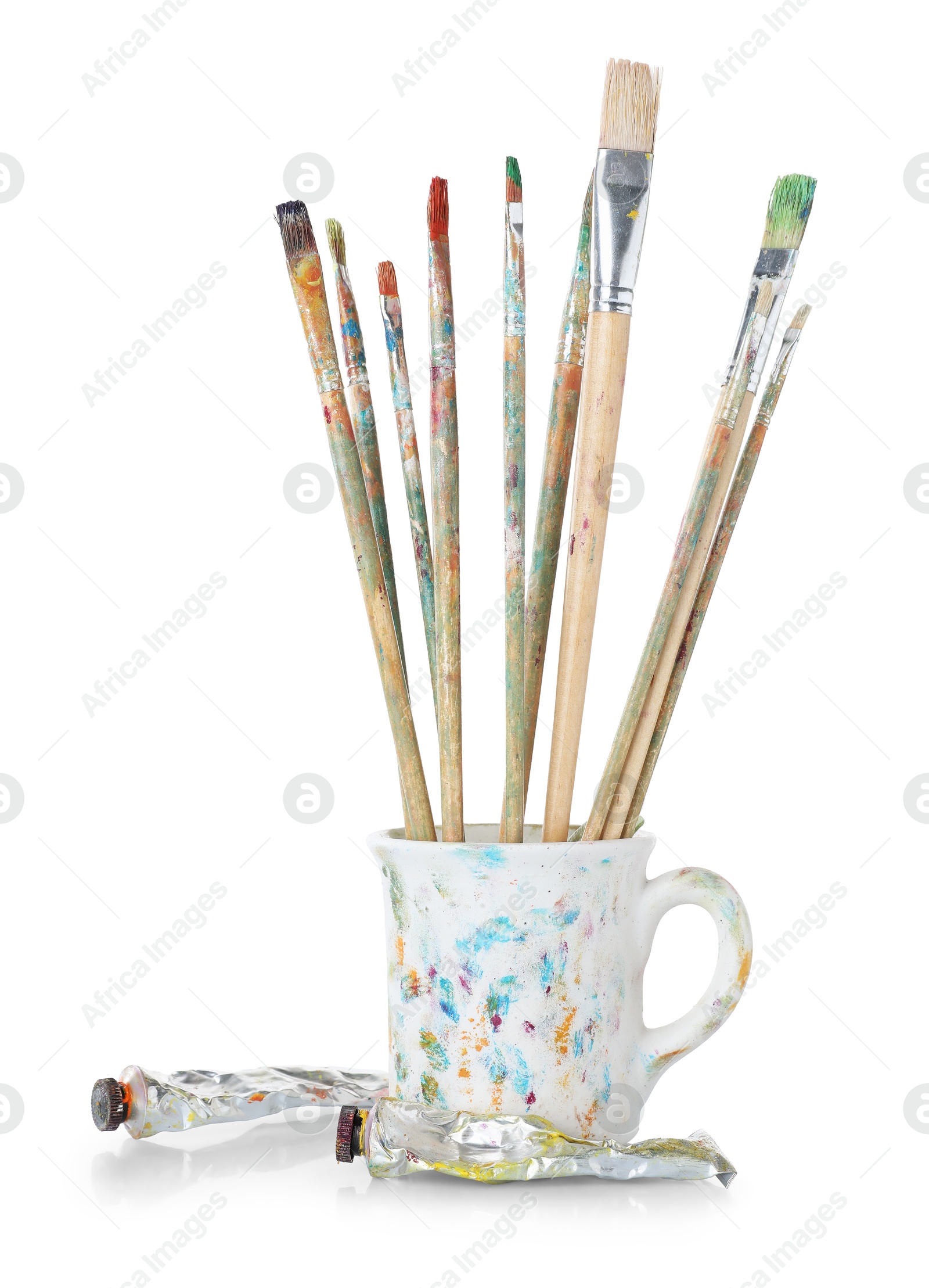 Brushes with color paints isolated on white Photo of Brushes with color paints isolated on white