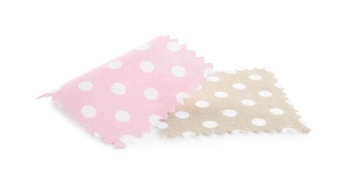 Photo of Samples of fabrics with polka dot pattern isolated on white