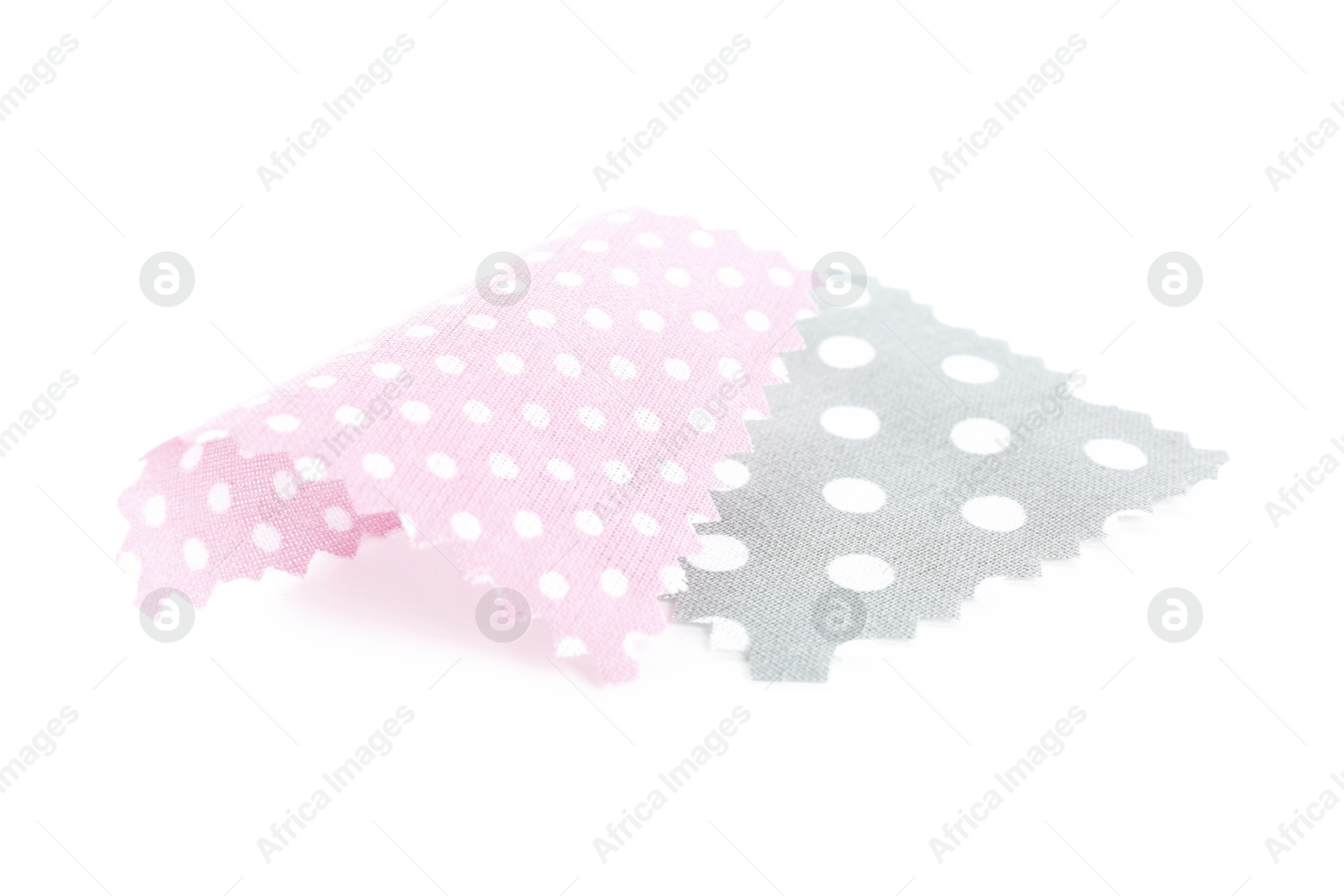 Samples of fabrics with polka dot pattern isolated on white Photo of Samples of fabrics with polka dot pattern isolated on white