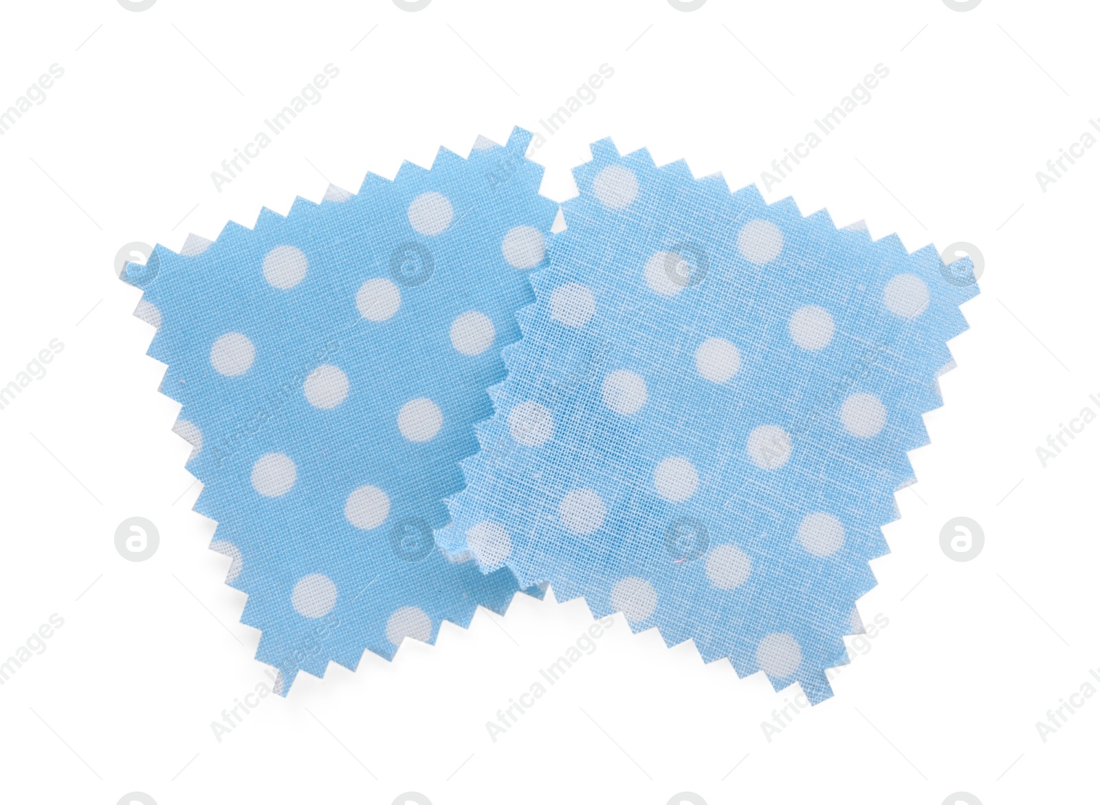 Samples of fabrics with polka dot pattern isolated on white, top view Photo of Samples of fabrics with polka dot pattern isolated on white, top view