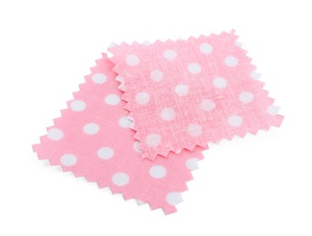 Photo of Samples of fabrics with polka dot pattern isolated on white
