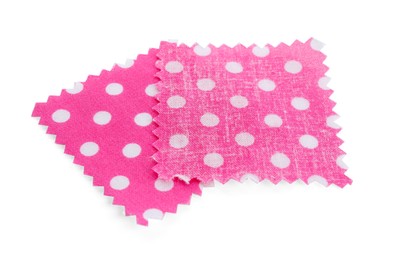 Photo of Samples of fabrics with polka dot pattern isolated on white