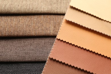 Photo of Samples of different fabrics as background, closeup
