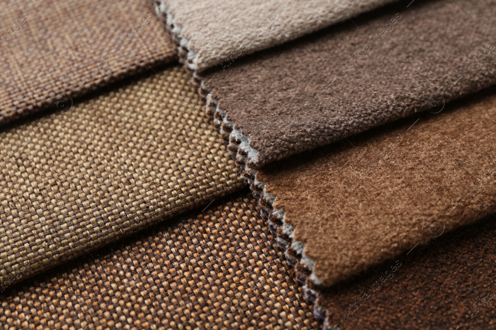Samples of different fabrics as background, closeup Photo of Samples of different fabrics as background, closeup