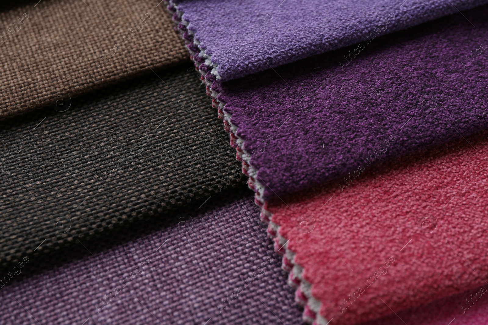 Samples of different fabrics as background, closeup Photo of Samples of different fabrics as background, closeup
