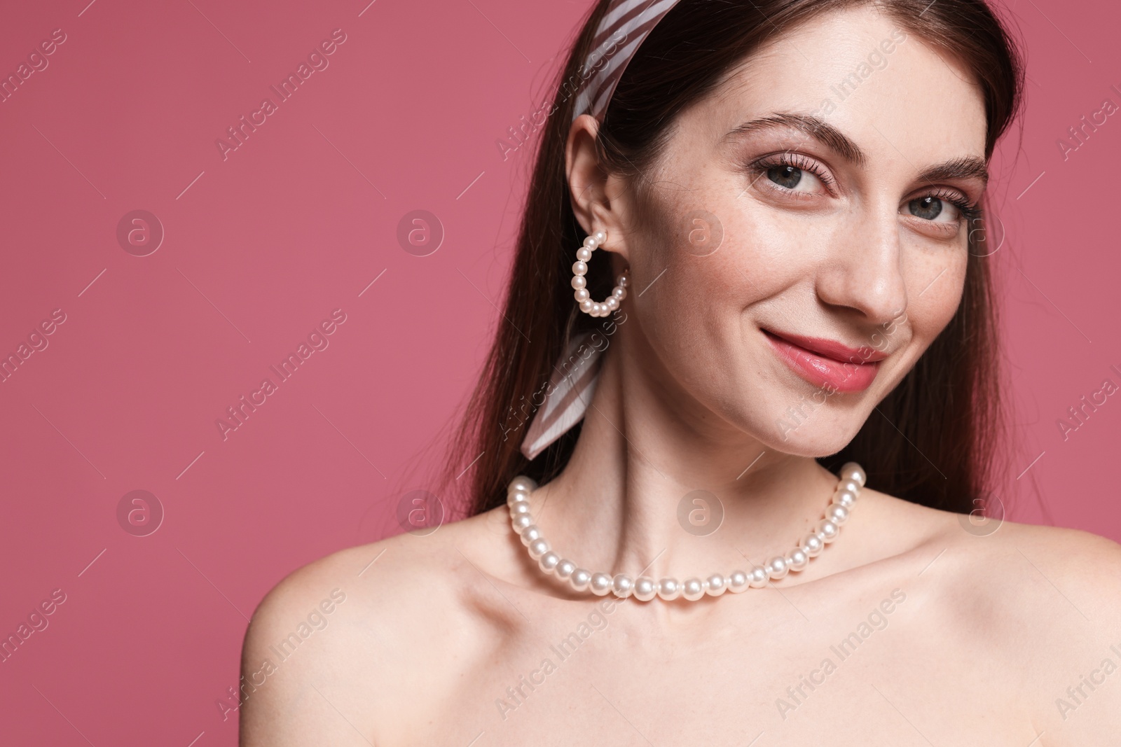 Fashionable portrait of beautiful woman in stylish outfit on pink background. Space for text Photo of Fashionable portrait of beautiful woman in stylish outfit on pink background. Space for text