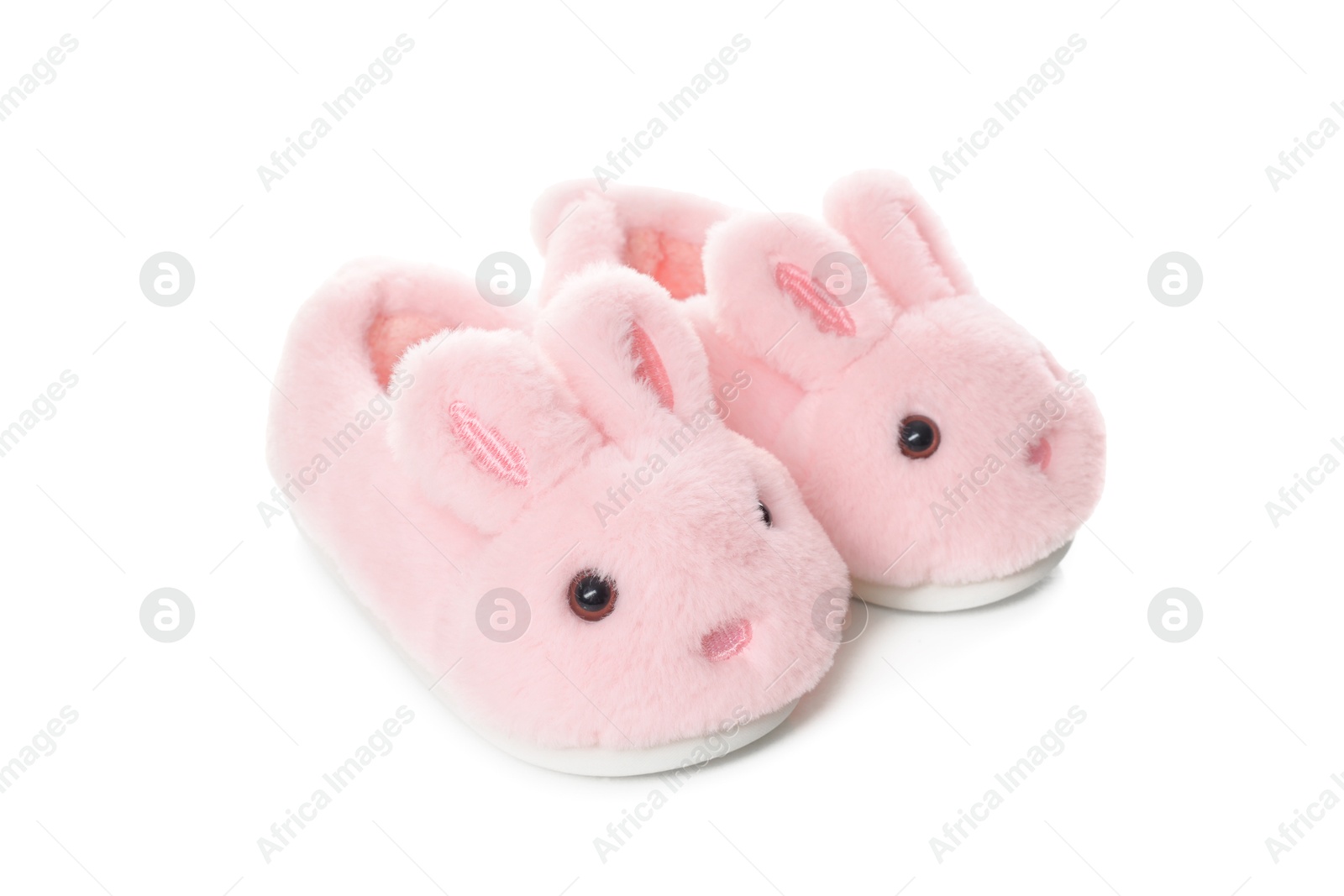 Cute kid slippers in shape of bunnies isolated on white Photo of Cute kid slippers in shape of bunnies isolated on white