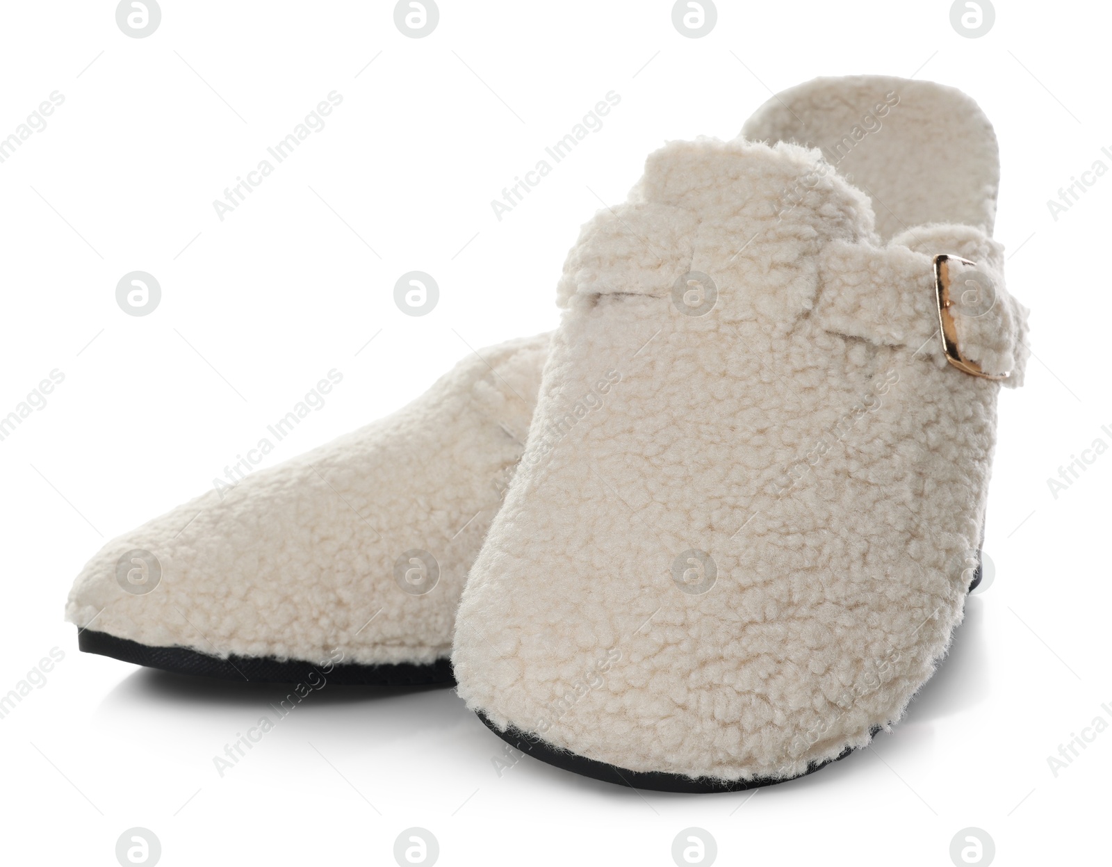 Pair of stylish slippers isolated on white Photo of Pair of stylish slippers isolated on white