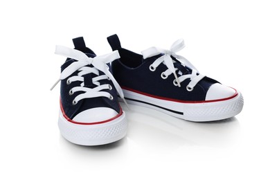 Photo of Pair of stylish dark blue sneakers isolated on white