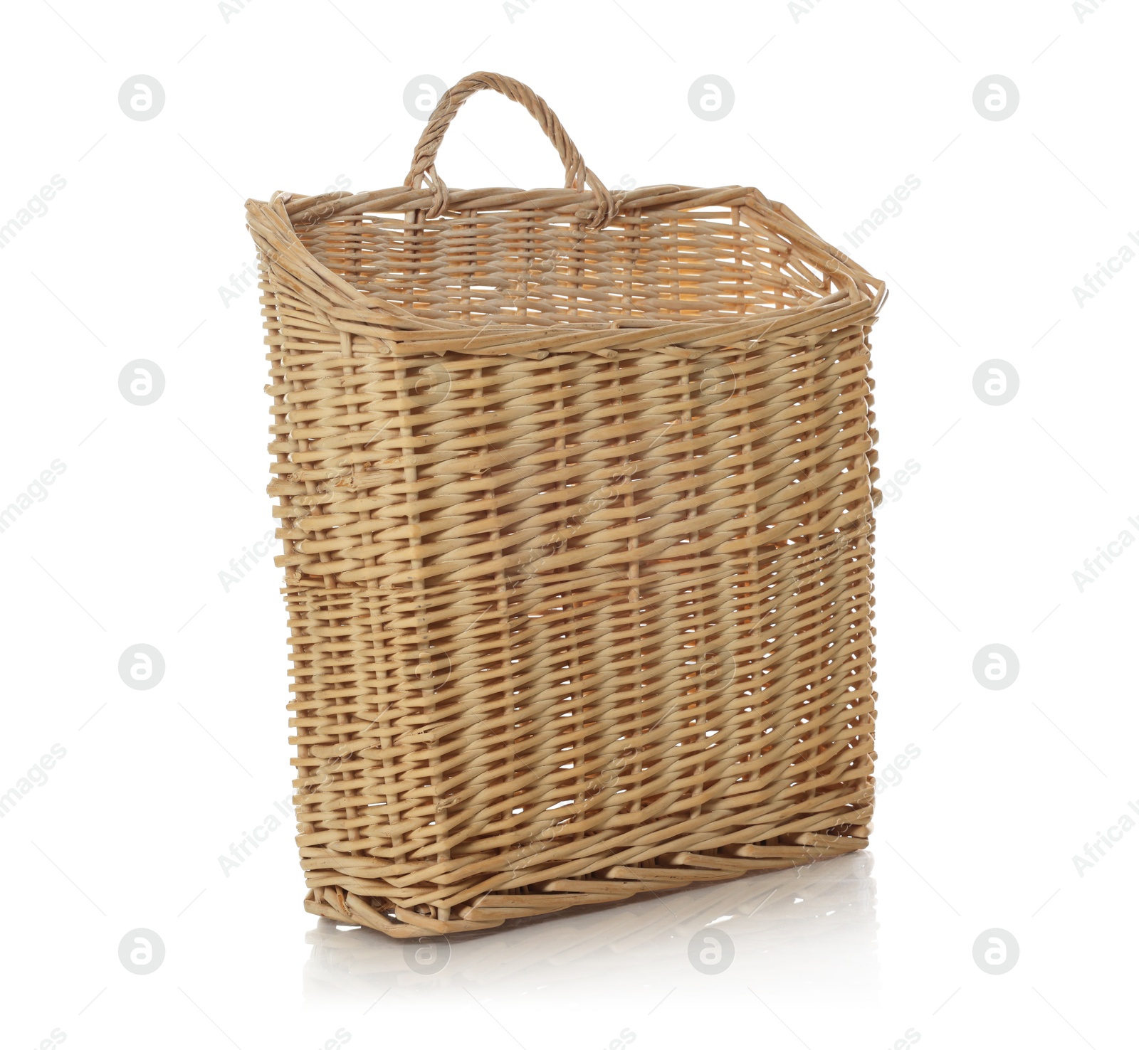 One empty wicker basket isolated on white Photo of One empty wicker basket isolated on white