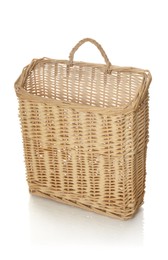 Photo of One empty wicker basket isolated on white