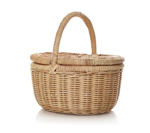 Photo of One empty wicker basket isolated on white