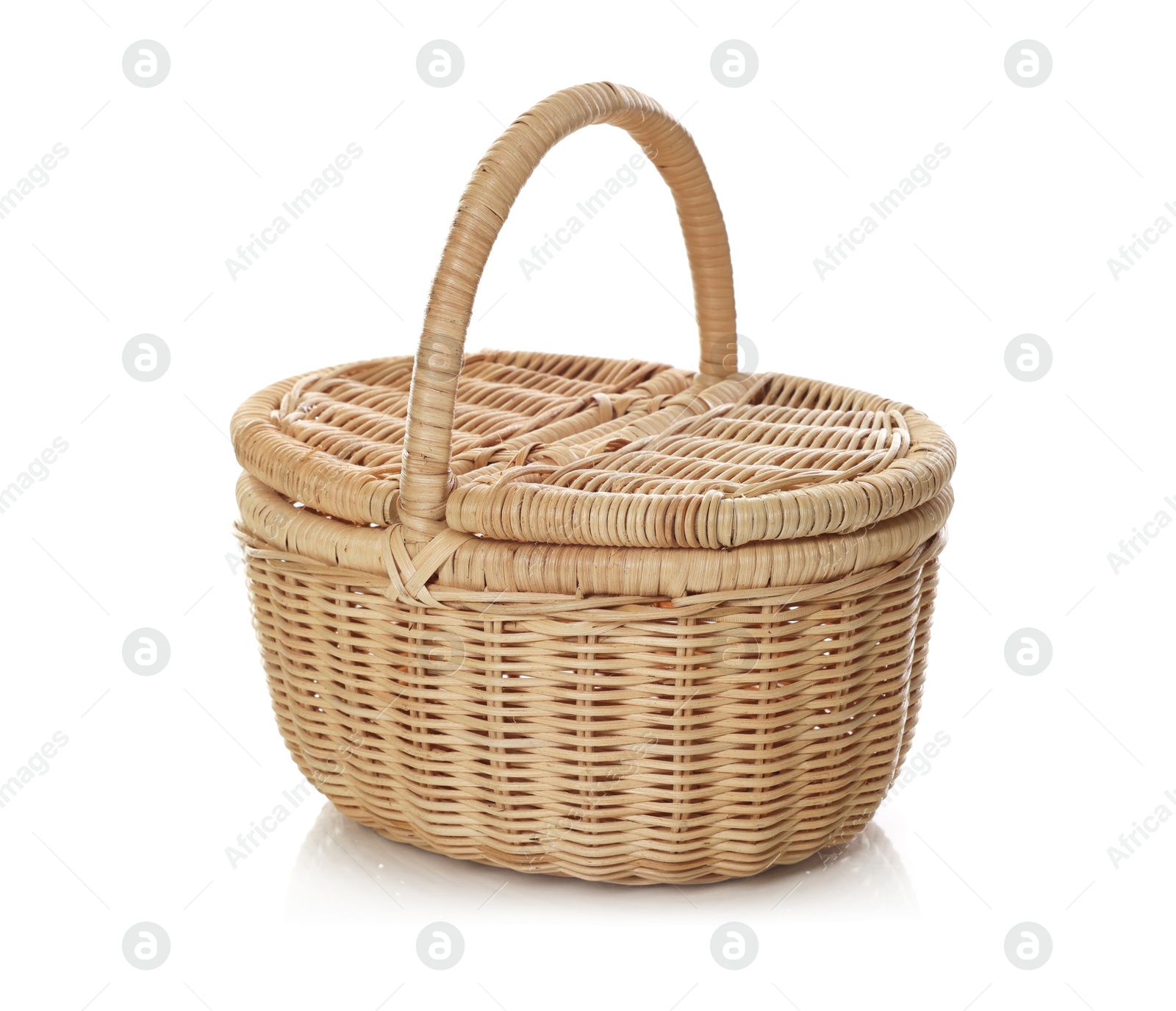 One empty wicker basket isolated on white Photo of One empty wicker basket isolated on white