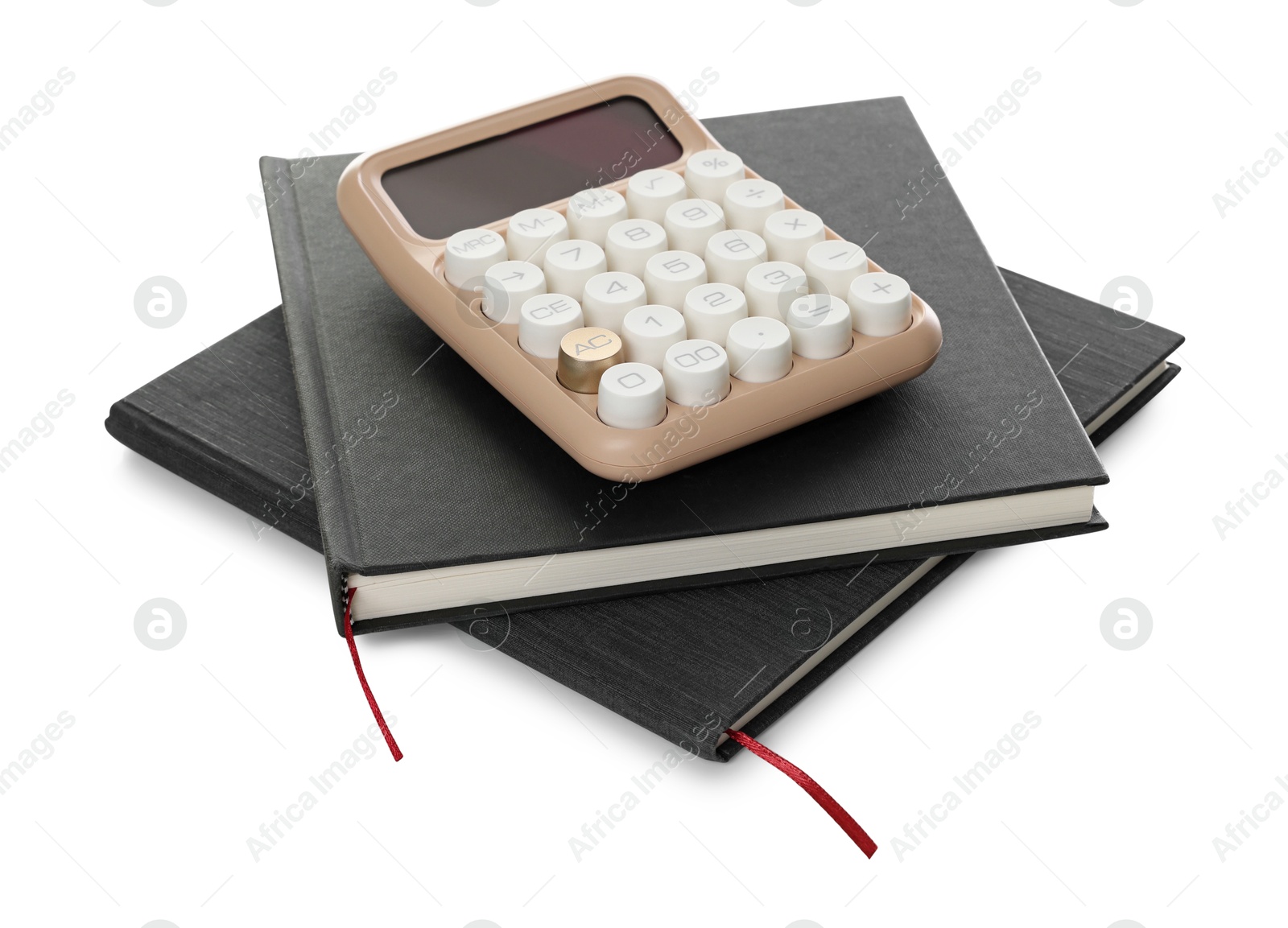 Hardcover notebooks and calculator isolated on white Photo of Hardcover notebooks and calculator isolated on white