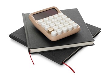Photo of Hardcover notebooks and calculator isolated on white