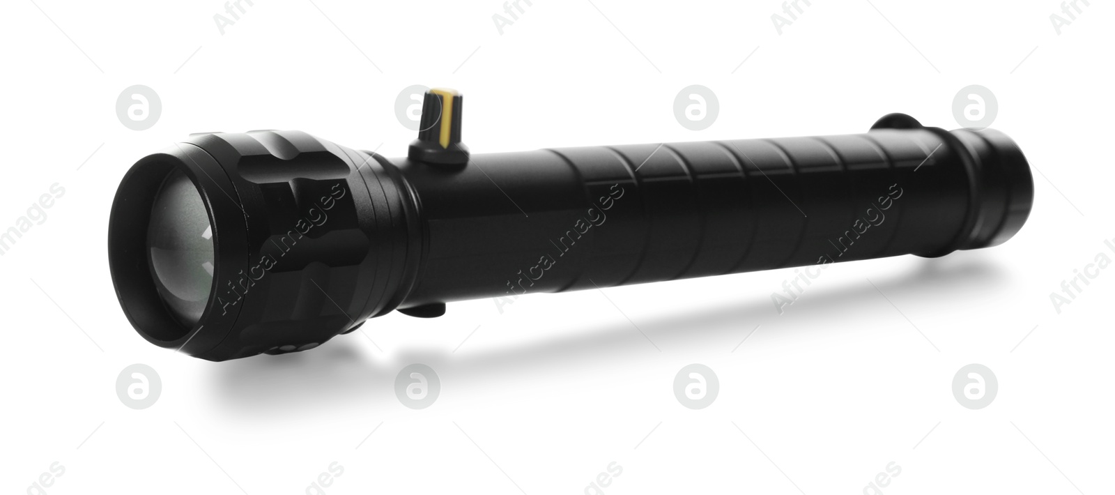 One modern black flashlight isolated on white Photo of One modern black flashlight isolated on white