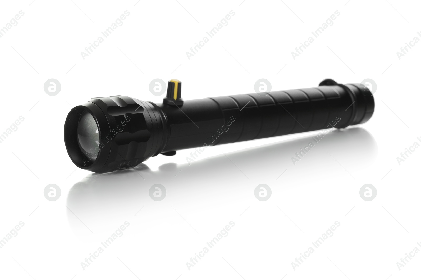 One modern black flashlight isolated on white Photo of One modern black flashlight isolated on white