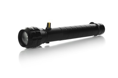 Photo of One modern black flashlight isolated on white