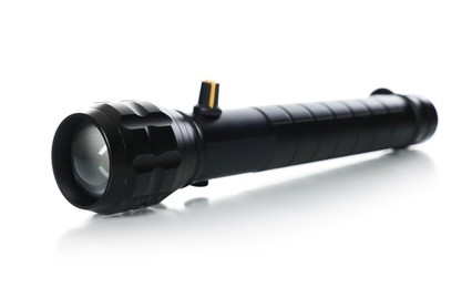 Photo of One modern black flashlight isolated on white