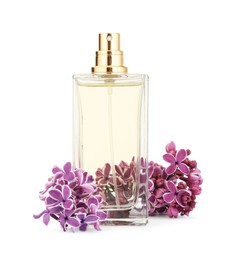 Photo of Bottle of luxury perfume and lilac flowers isolated on white