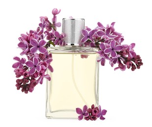 Photo of Bottle of luxury perfume and lilac flowers isolated on white